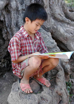 A boy in a rural Lao village discovers the fun of reading